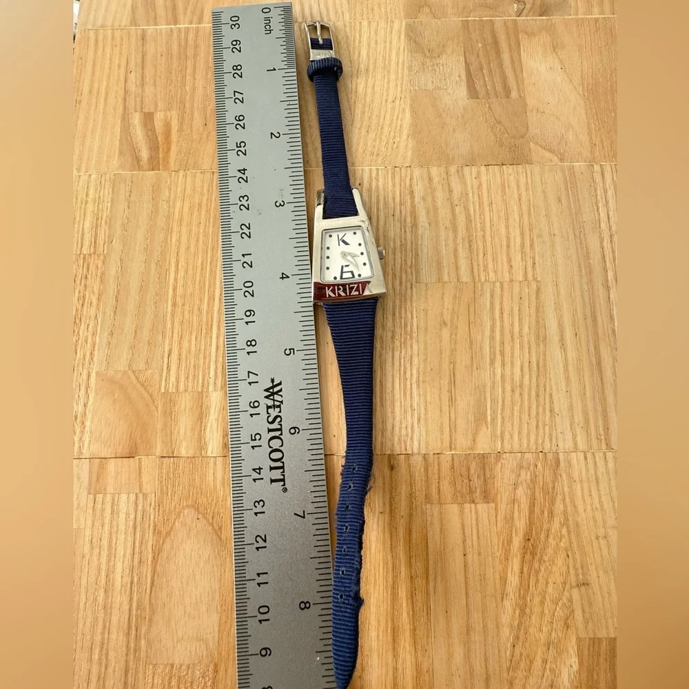 Krizia ladies silver tone trapezoidal watch NEW BATTERY